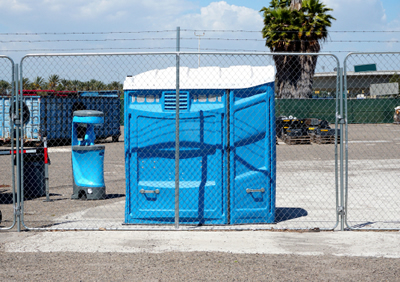 ada porta potty in a construction yard