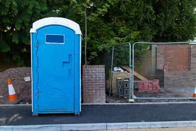 portable toilet near a construction site